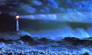 lighthouse at night shining over rough water