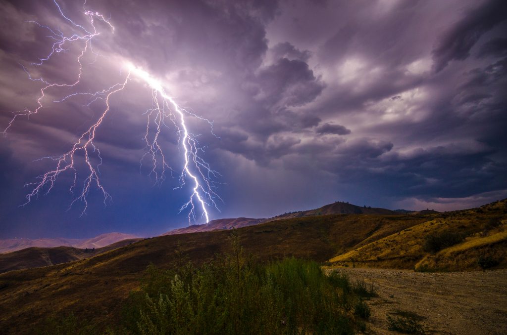 lightning striking landscape