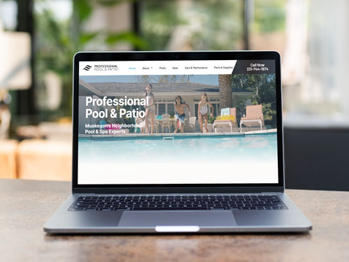 Professional pool and patio website on a laptop
